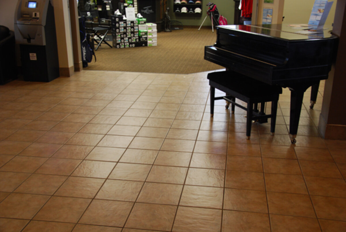 A clean ceramic tile floor in a commercial showroom