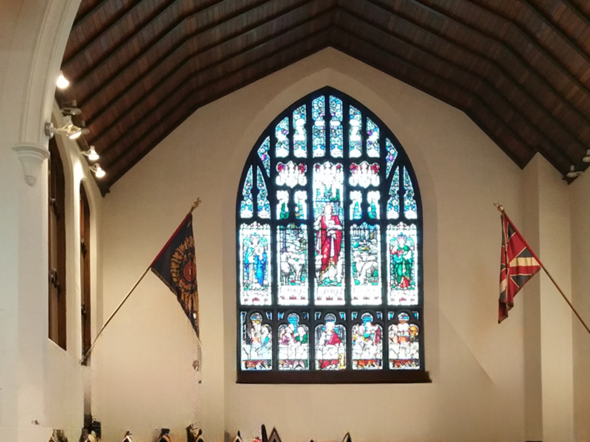 A church sanctuary with stained glass windows, maintained by Control Janitorial Barrie