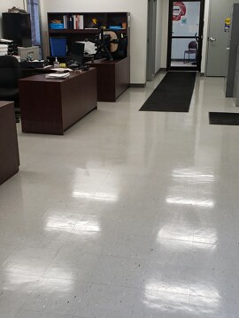 A clean, finished office floor and reception area cleaned by Control Janitorial Barrie